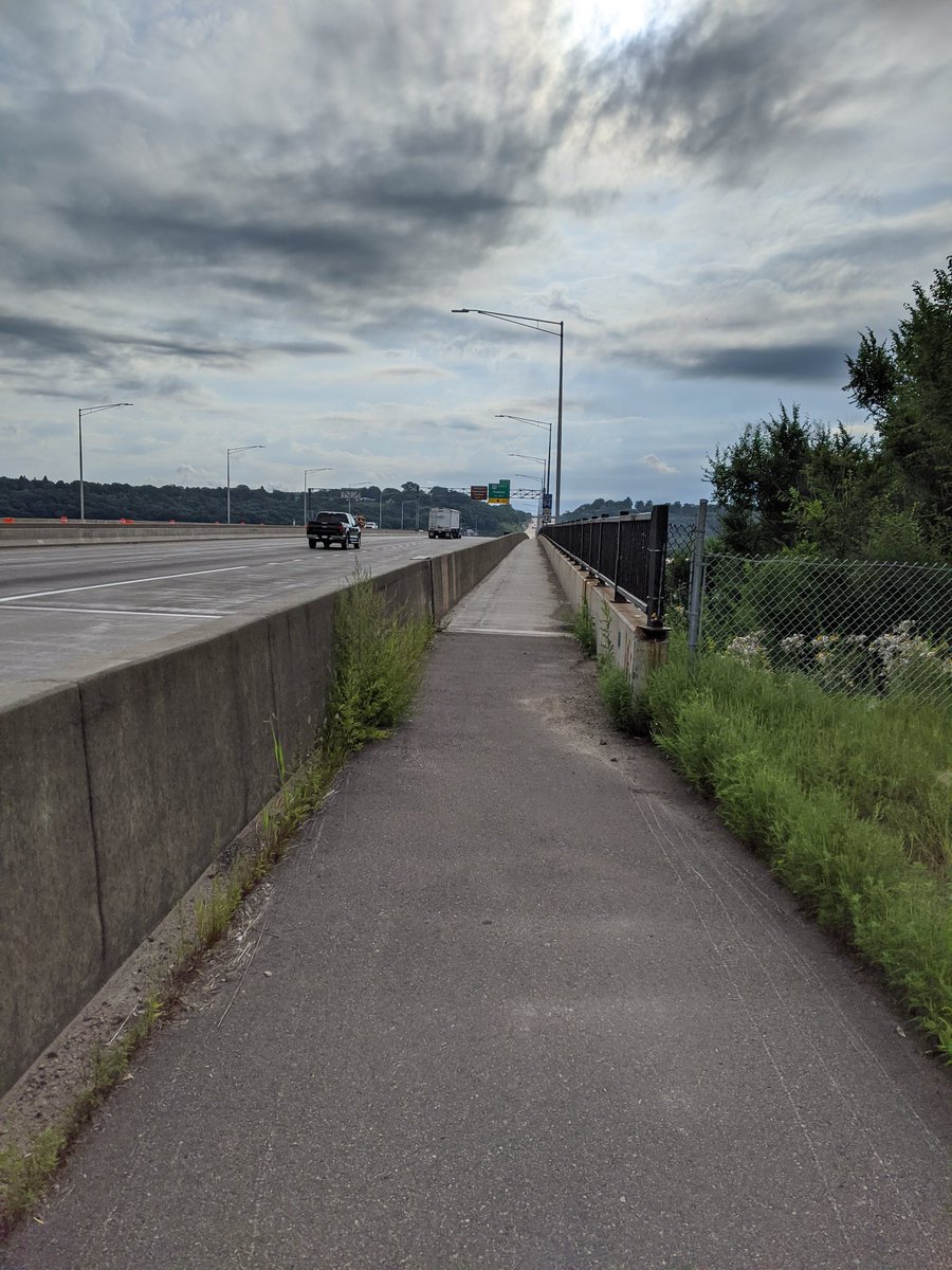 Picture of the narrow trail next to the interstate.