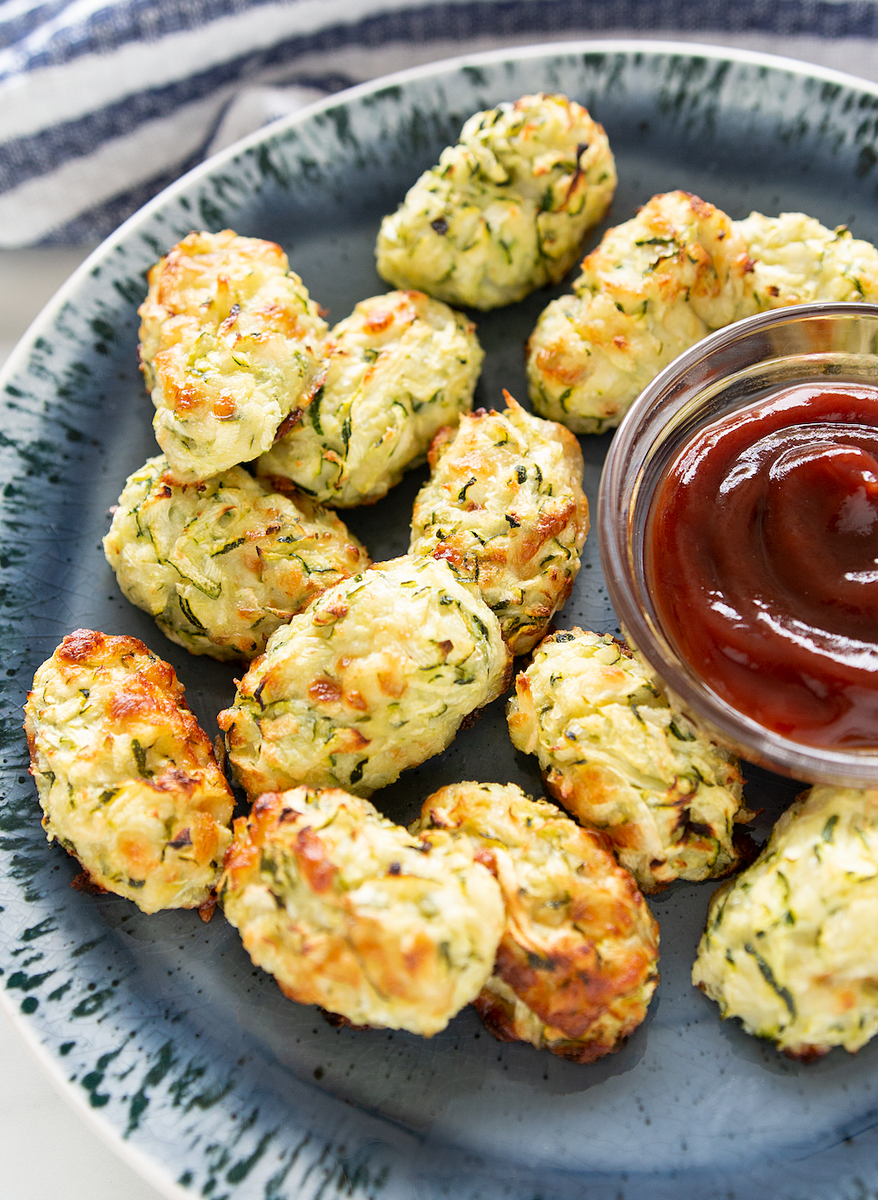 LHTCook's tweet photo. This healthier solution to classic tater tots, these Zucchini Tots use fresh zucchini to make a great, baked snack whenever the craving hits.  Link: https://t.co/GxuLScN4XW
#zucchini #summer #healthy #healthyrecipes #vegetarian https://t.co/lGQMtYYrxQ