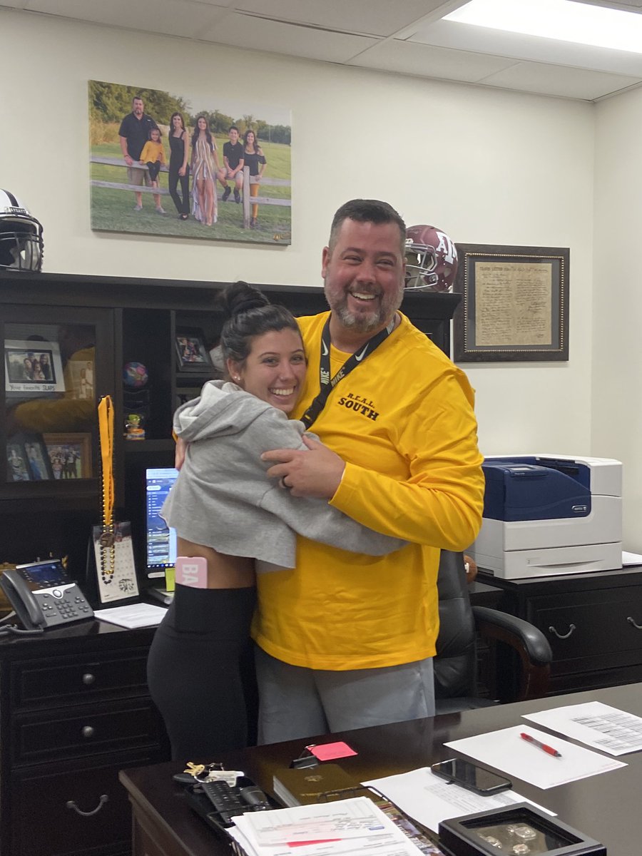 christymwoods's tweet photo. He had no idea she was flying in today. Loved the look and surprise on his face♥️@Coach_Woody50 @baileynwoods https://t.co/vBzKHn36ah