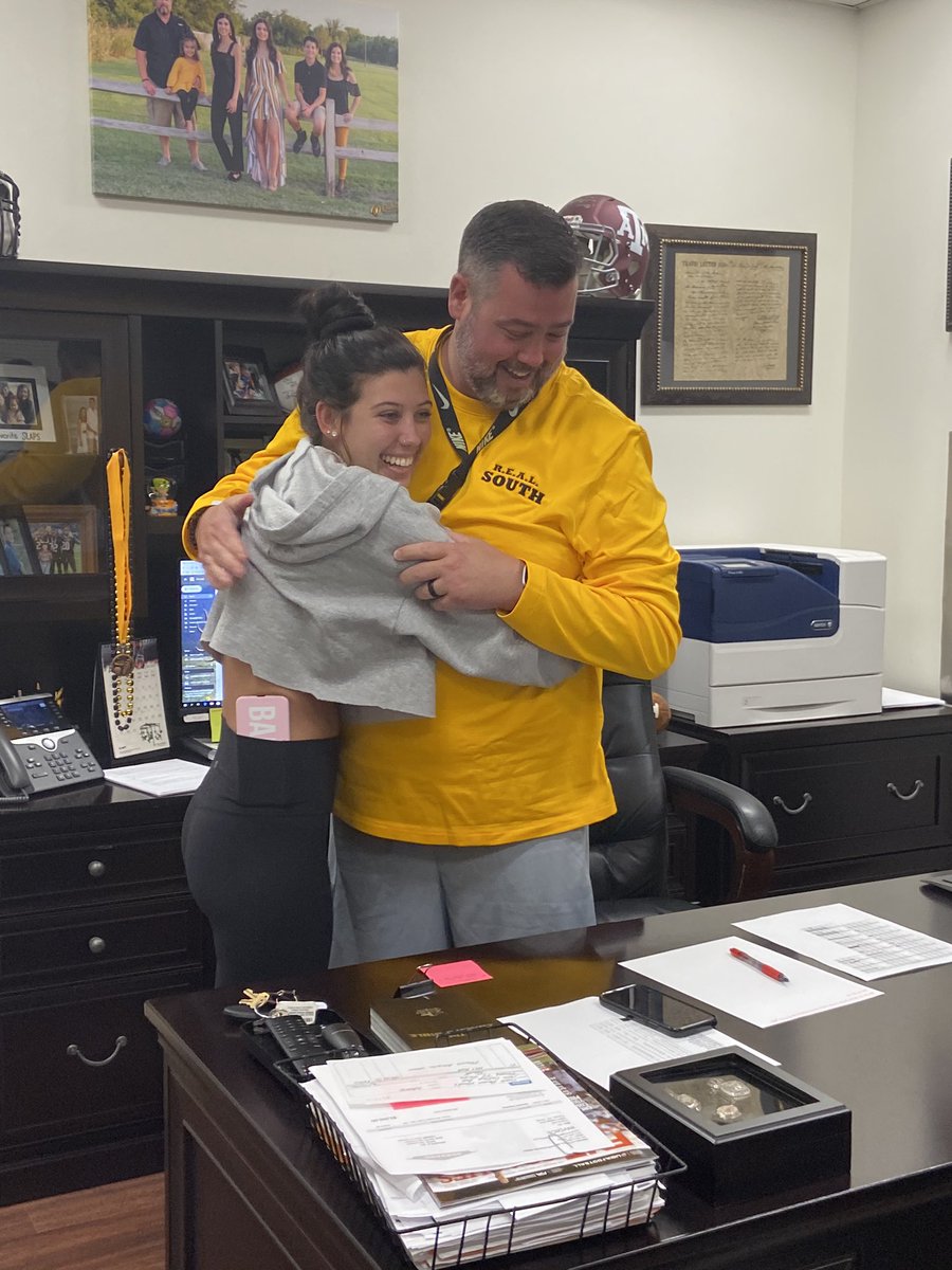 christymwoods's tweet photo. He had no idea she was flying in today. Loved the look and surprise on his face♥️@Coach_Woody50 @baileynwoods https://t.co/vBzKHn36ah