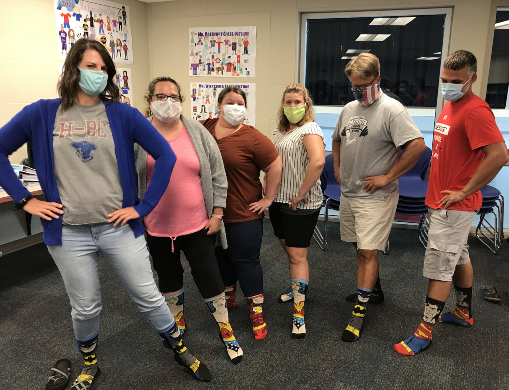 hbcpatriots's tweet photo. Shout Out to our H-BC Secondary PBIS (Positive Behavior Interventions Supports) Team. This team met for 2 days to plan for the school year with this goal: BEST SCHOOL YEAR EVER! These staff members are super heroes (see socks)! Ms. Bass missing/invisible. #PatriotGRAD #superhero https://t.co/UVcBweErwQ