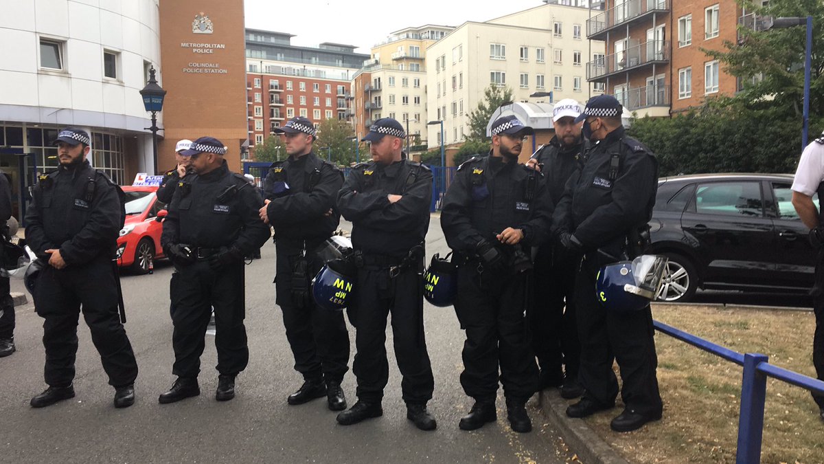Riot police outside Colindale. Five people arrested included two members of <a href="/4FrontProject/">THE 4FRONT PROJECT</a> - one of whom needs medical attention. All this over the arrest of a 14yo boy. Approx 40 police standing here, refusing to release the five.