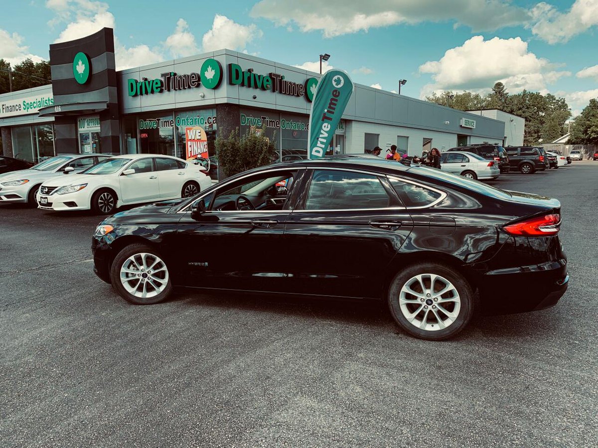 DriveTimeCanada's tweet photo. This 2019 Ford Fusion Hybrid SEL give you the best of both worlds. Gas engine when you are low on battery with that traditional engine roar and Electric when its not necessary to pollute! Come in today to see for yourself or #Apply2BApproved!

https://t.co/ZhnJfwfEOD https://t.co/ox1dqOd1q2