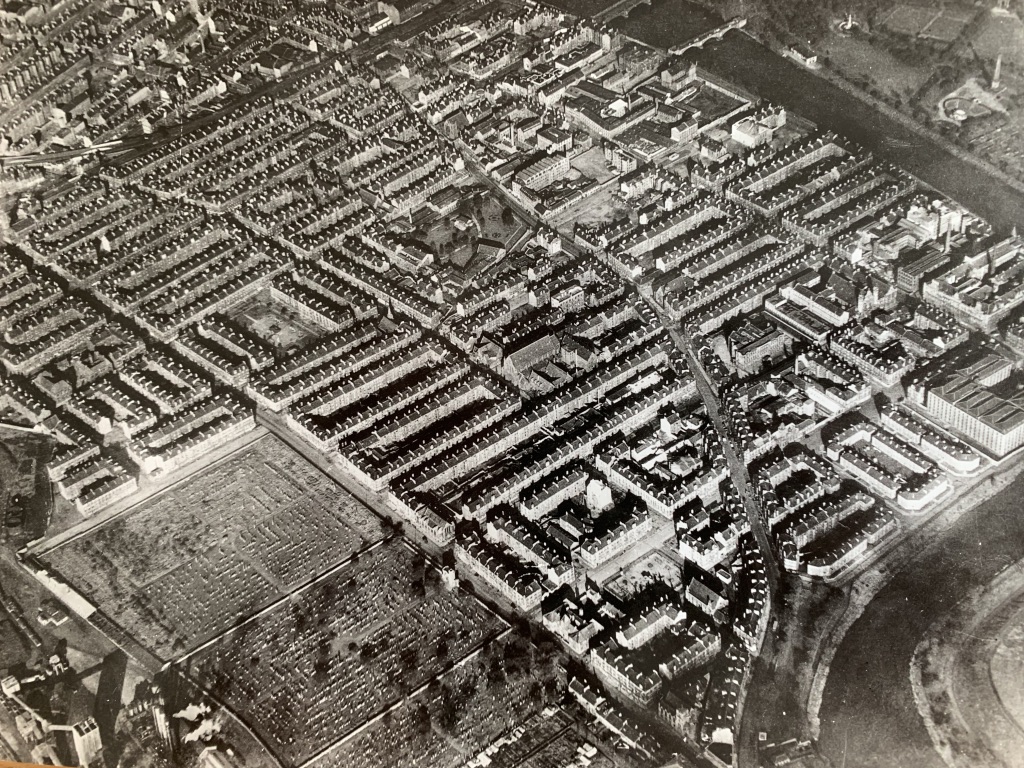 This pair includes an aerial photo of the original Hutchesontown / Gorbals, and then a model of the redevelopment collaged in highlighting the proposed shift away from the existing tenemental urban grain...