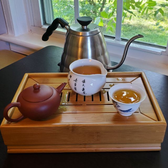 Daily tea timeEastern Beauty (東方美人)Using this setup (clay pot and chahai) with another oolong tea (named "eastern beauty") that is a bit stronger in flavor. Tea like this usually improves with each infusion, and is ideal by the 6th or 7th cup.