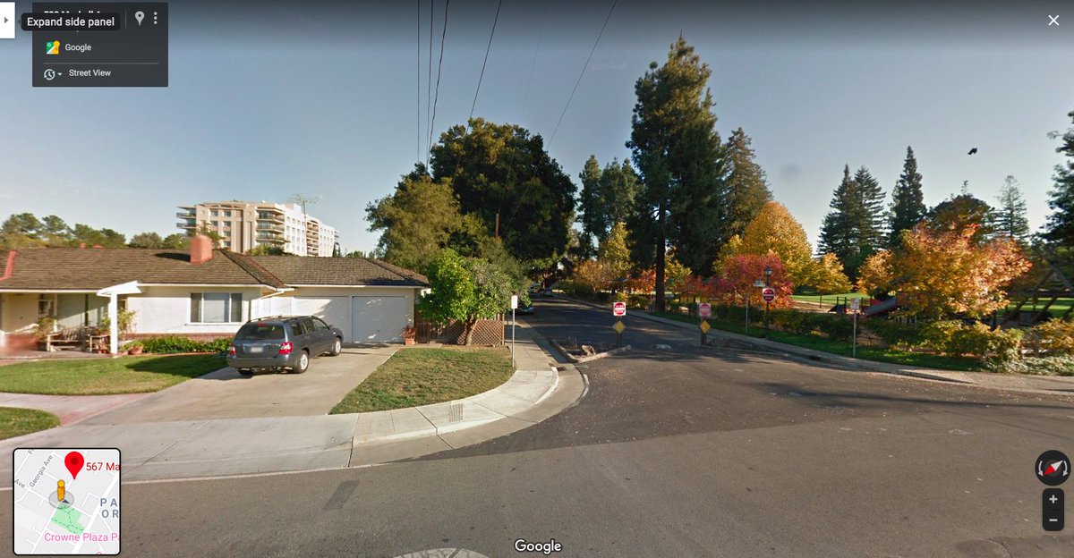 Here's the view of the property half a block away. It was behind a row of single-family homes, with a tall apartment building on the other side.