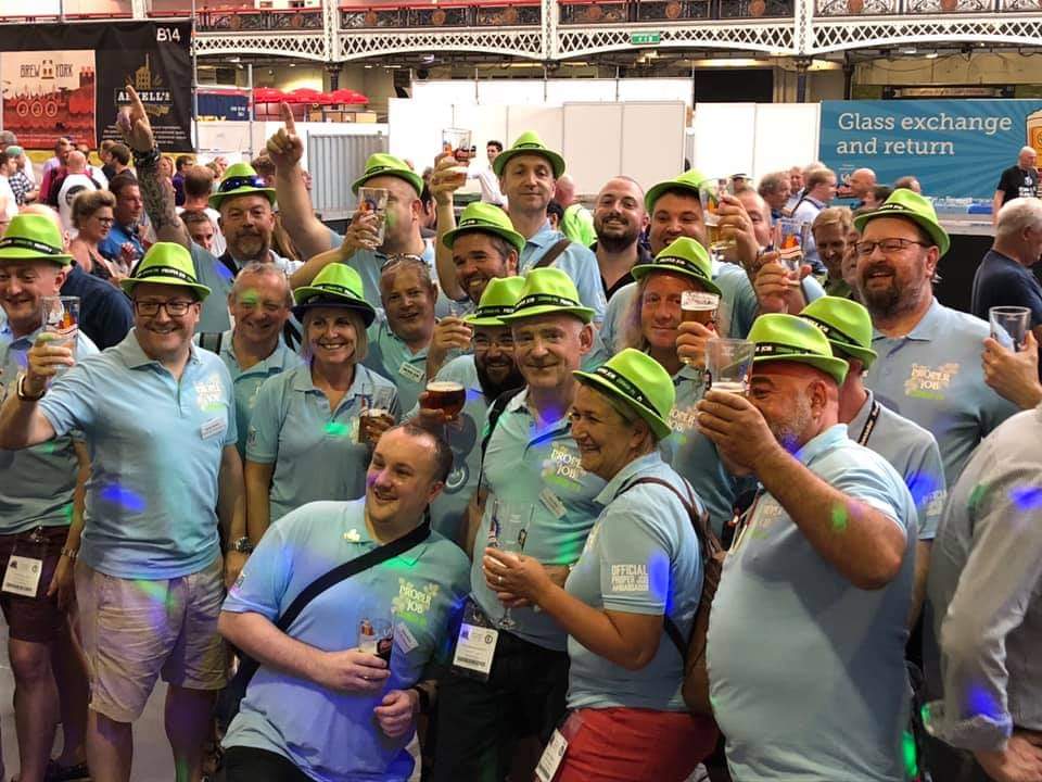 sportstog1's tweet photo. This is the yearly get together at the #GBBF , unfortunately can't go this year so here's the pic from 2 years ago #properfriday #properbeer #ambassadorstogether #london @KazBiker I could see you in blue if you liked proper job ale ๐บ https://t.co/WkRgfLKsfy