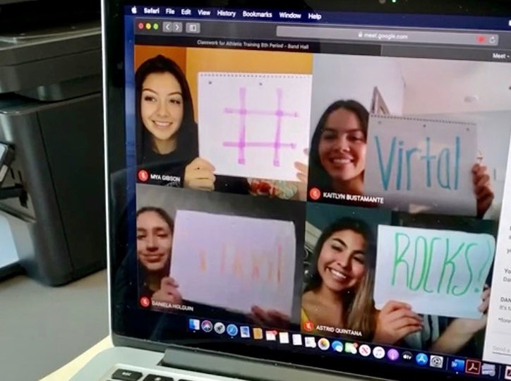HHS_ATraining's tweet photo. Athletic training students working collaboratively to review & answer questions on an article on “The 6 Domains of Athletic Training”. They finished week 2 with the hashtag #Virtualschoolrocks @ClintISD @Mesquita_HHS @Waldecker10 @ntrevizo3 @HHSScorpions https://t.co/IoWa3sVDIM