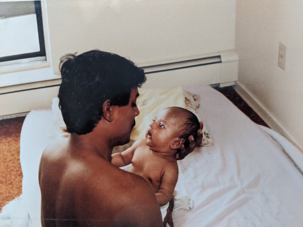 I asked my parents what it was like for them when I was born. My dad was a PhD student and they both worked opposite hours to ensure I was cared for. Little money. We lived in an empty apartment, with only a bed on the floor. It was hard to visualize, but then I saw this picture.