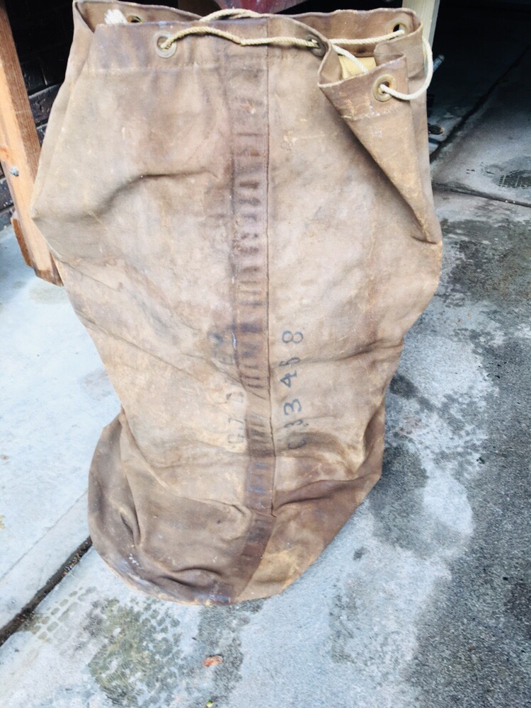 Here is his rucksack, it is made of heavy canvas and large. His name and serial number are still just visible stamped on it.My biggest wish is for the tigers to continue winning games and flags for him while he can still relish it.