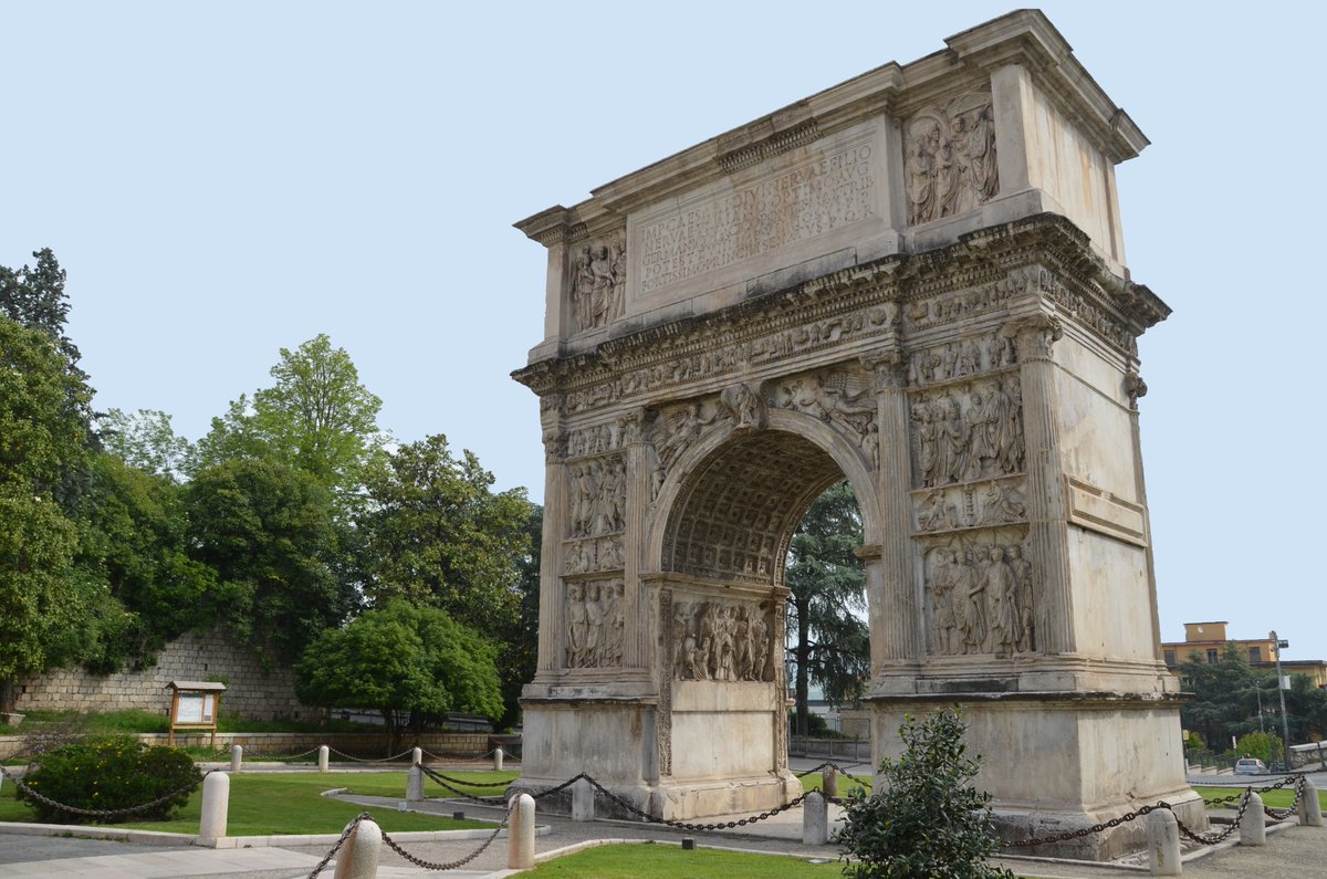 The Arch of Trajan at Benevento (Italy) was set up in AD 114 outside of Beneventum to commemorate the of the new Via Traiana between Rome and Brundisium.Each side of the arch carries relief panels that depict different aspects of the emperor's care for his people and the Empire.