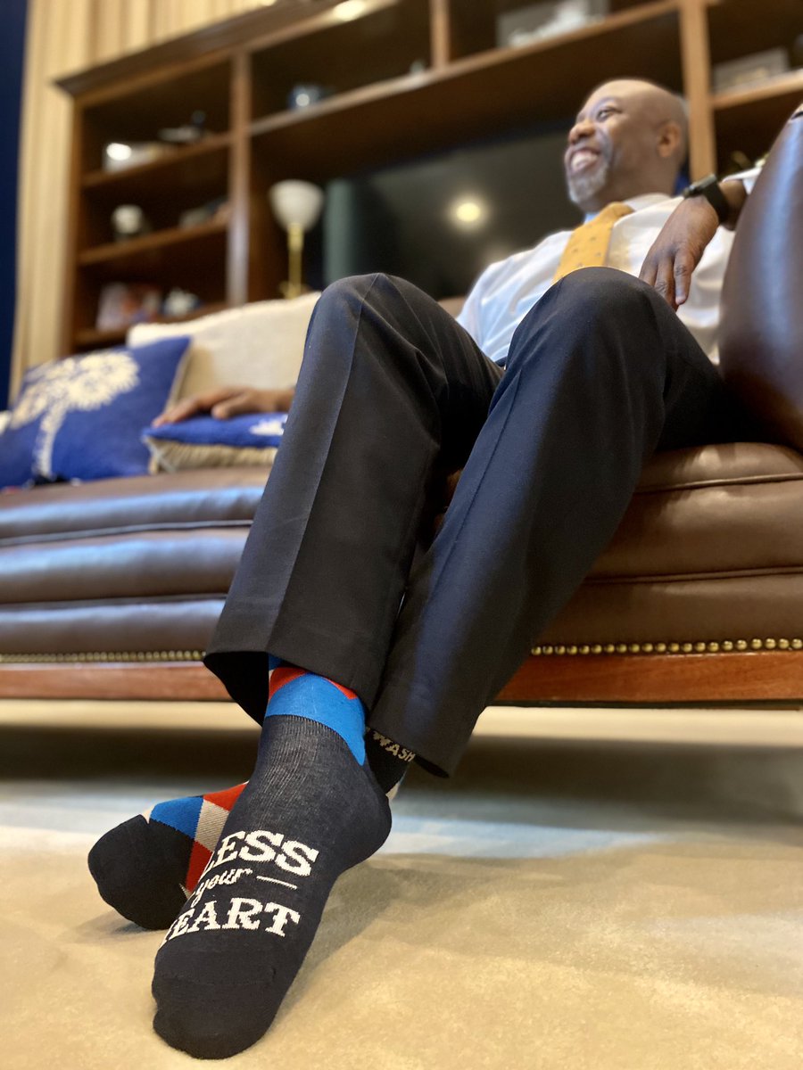SenatorTimScott's tweet photo. I was so happy to bring some Carolinian common sense to my colleagues this week. Just a reminder to walk the talk with these “Scott Says Socks.” #Hogwash #BlessYourHeart #ScottSays #SockittoMe #SCRocks https://t.co/ffnG6Jsfvr