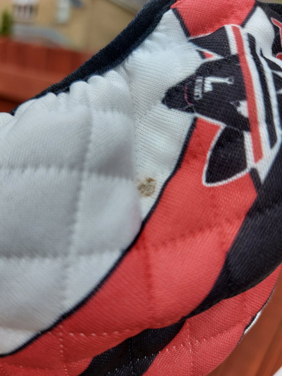 nigelnield's tweet photo. @NicwMUFC hi, received my new face mask the other day but there's a mark on it that after washing hasn't come off, it's faded a bit but still there https://t.co/muk2nq3Sxh