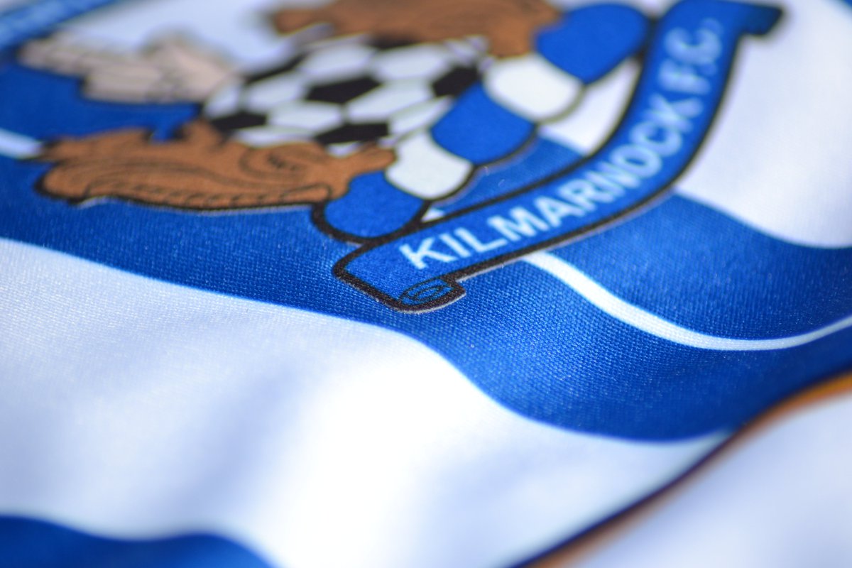 These badges are attached to the material across their entire surface. As long as you wash them to the instructions you shouldn't have any issues with them peeling. Technology has improved somewhat since the 90s. I get why people prefer embroidery but this still very good.