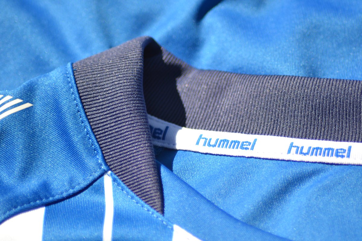 Nice to see ribbing material on both collars. Looks great quality, on the away shirt in particular. The yellow bands are woven in to the material rather than printed. Top quality.