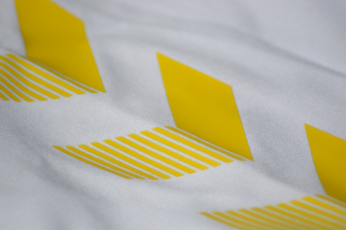 The Hummel chevrons are heat applied on both kits. There are fine details on both but look well applied, no loose edges like we saw on the Nike kits last year so I'm confident they won't come loose over time under normal wear and tear.
