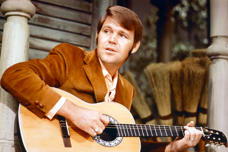 RollingStone's tweet photo. Glen Campbell died three years ago today. Check out our list of his 20 essential songs https://t.co/IWzFc7grYk https://t.co/8aNXwoE6Ua