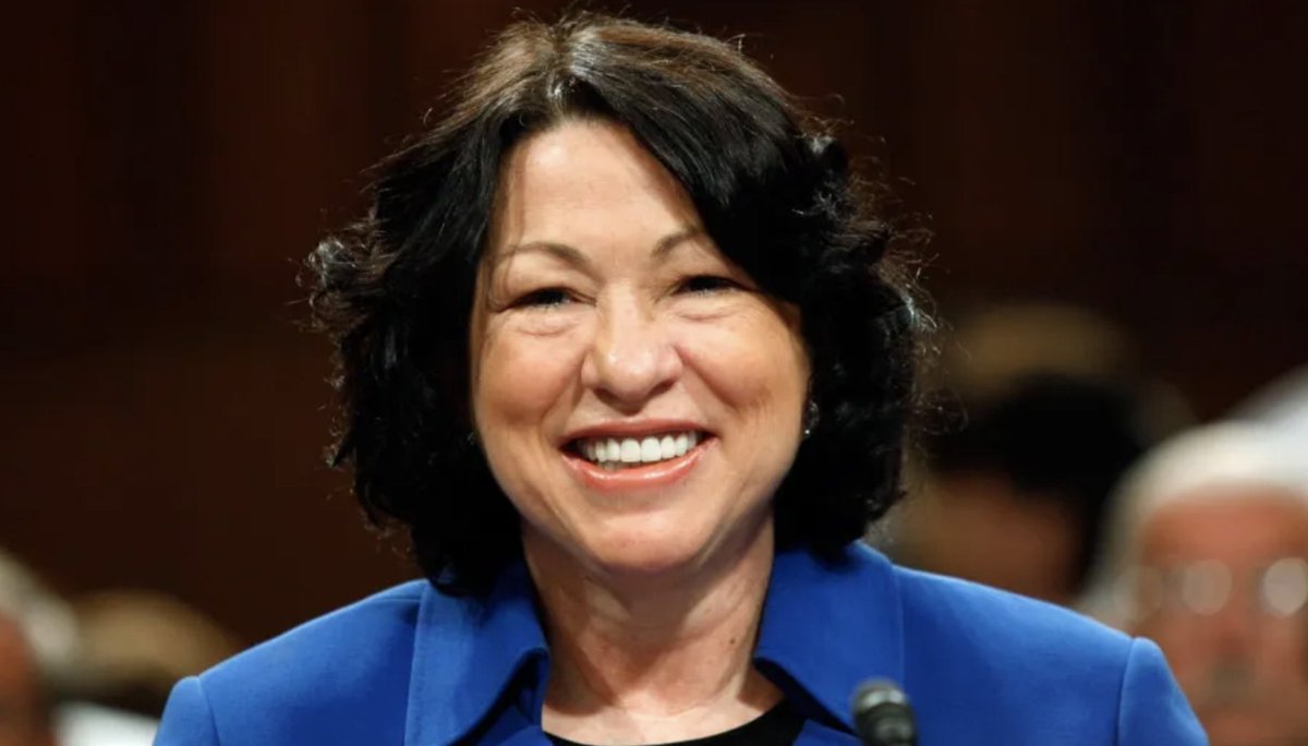 Photograph of Sonia Sotomayor smiling and looking into the camera.
