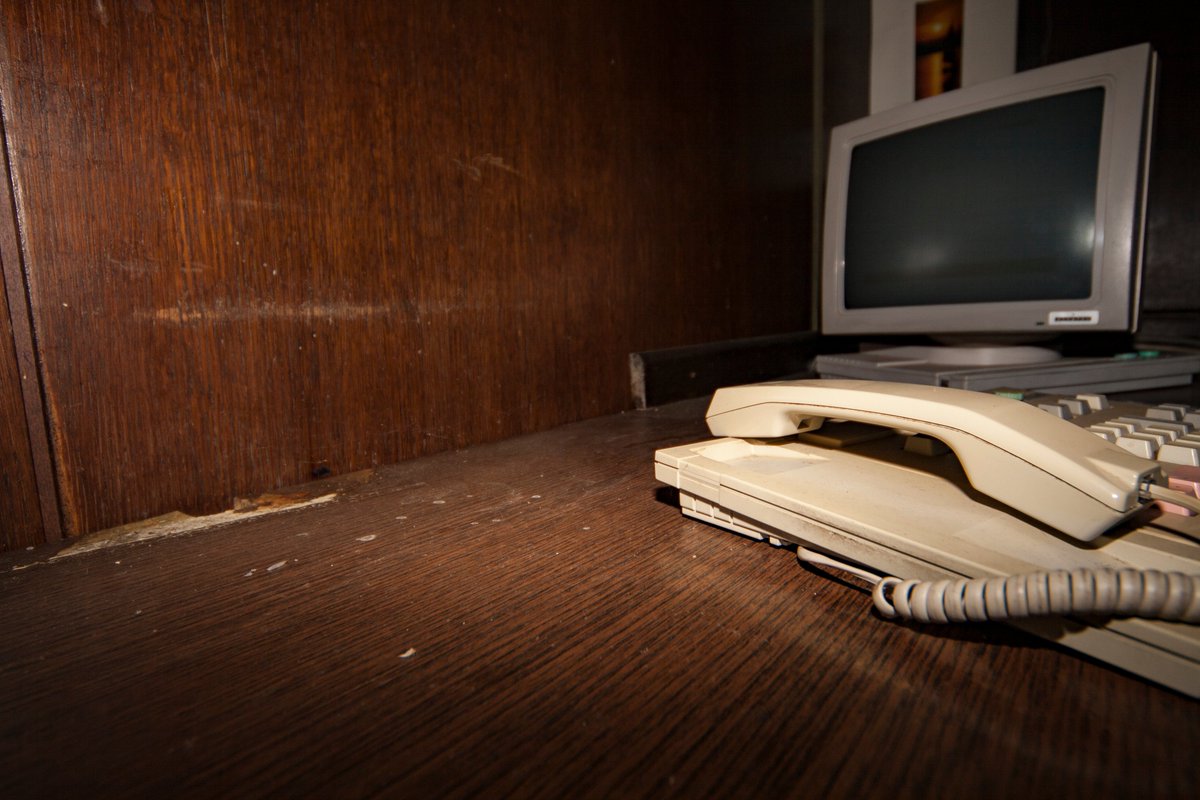 So earlier today I was looking through old photos I took at an abandoned hotel on the Adriatic coast, and I came across this funny looking terminal. Anyone have any idea what it is? I'm pretty confused by the keyboard. I'm guessing it's some kind of reception console attendant?