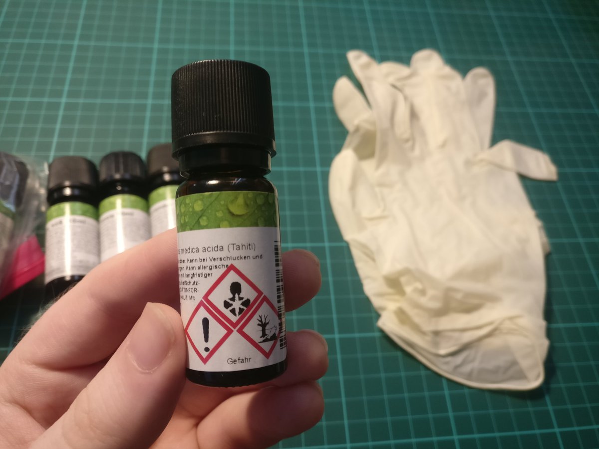 We start by making a flavor emulsion from essential oils! These are extremely strong, and can cause skin irritations, so wear latex gloves for this step!