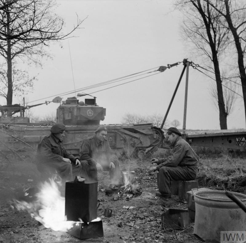 There was also an emergency charge in case the primary failed. After the firing the poles fell away and the bridge dropped to rest on its bankseats. (A photo from 1945 shows the cabling well, in this shot of a lowered SBG; IWM photo). 6/14