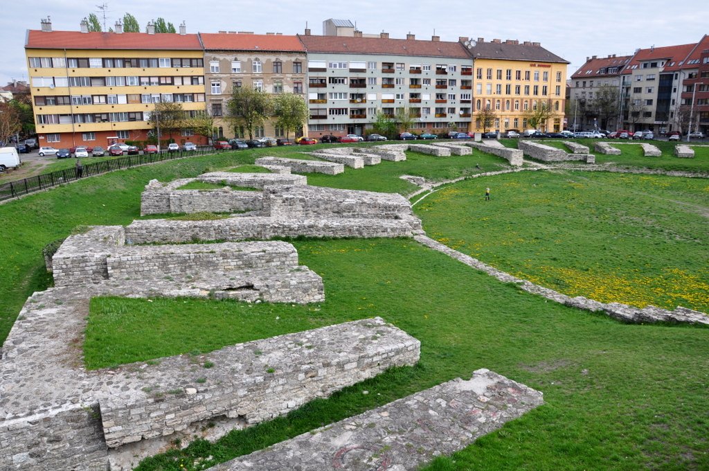 To be fair to the builders, they didn't exactly have many options. As the Western end of the (then) longest bridge over the Danube, all that traffic had to go somewhere. And building around Roman stuff had happened before, here's the Amphitheatre about 1km to the South: