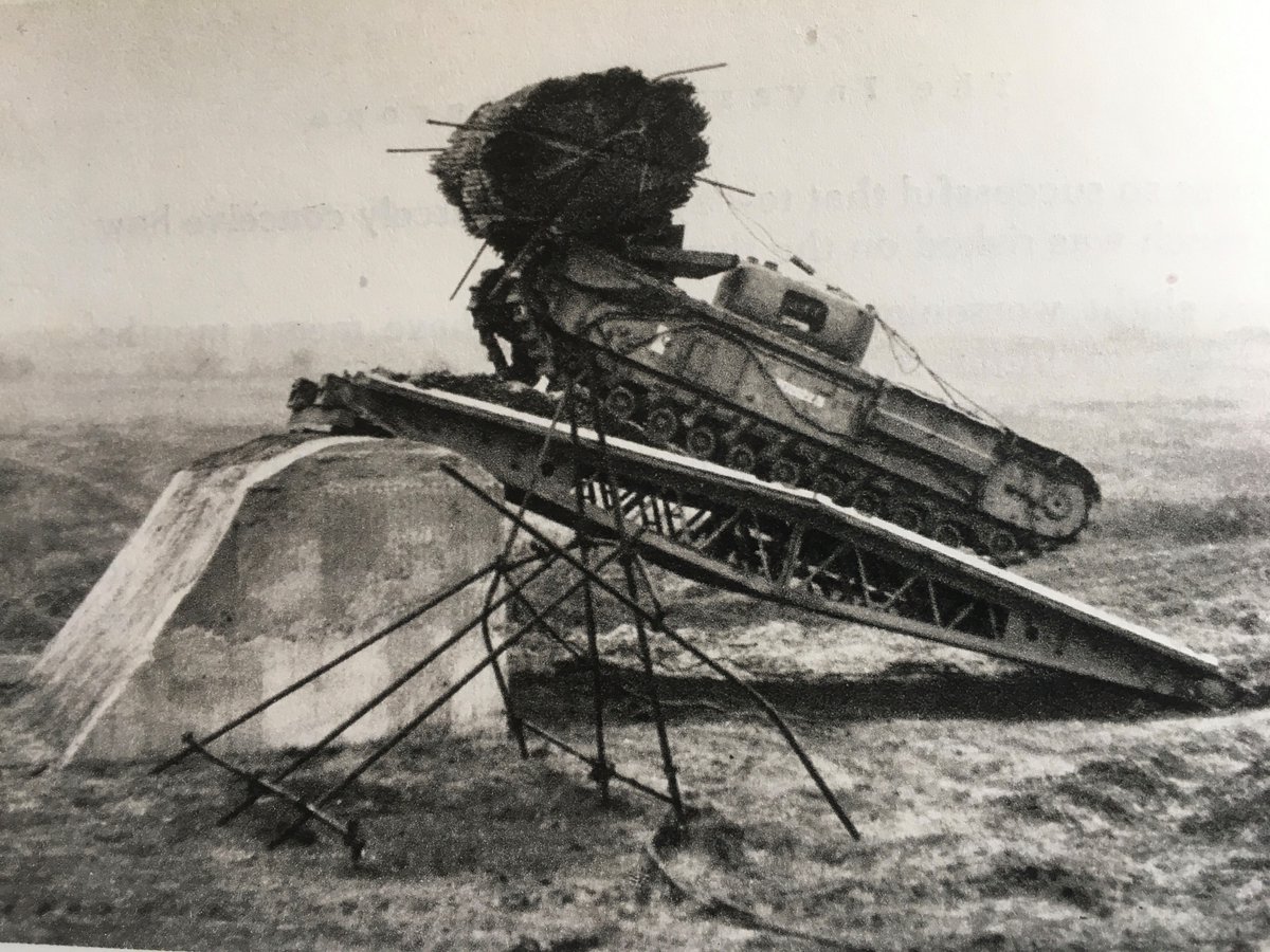 In training one routine was to lay a bridge against a seawall, and then a fascine AVRE would climb it and use the fascine to fill the drop on the other side. The SBG was used extensively, to climb seawalls (up to 14 feet), cross ditches, rivers, and craters. 7/14