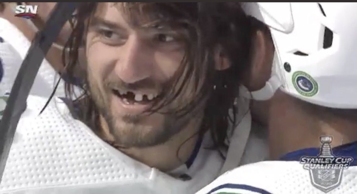yvrairport's tweet image. Big thanks to Chris Tanev. Not only did he score the series-winning goal against the Wild last night, his teeth are practicing perfect physical distancing as a great example for those travelling through YVR when possible. True hero. @Canucks #canucks #Nhlplayoffs2020