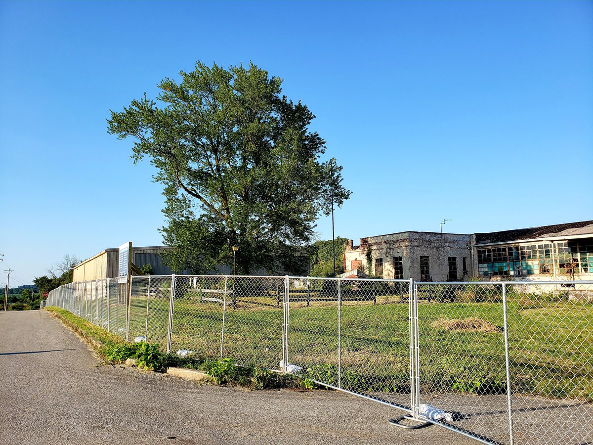 It's the little things that make a difference. A beautiful gateway sign and the beautiful trees that were just planted to flank the landmark sign. Cutting the grass in front of the soon to be demolished former sewing factory and along the right-of-way of Springfield Highway.