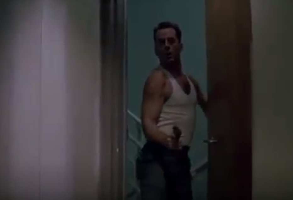 WAIT HOLD ON I THINK THIS IS BRUCE WILLIS BECAUSE I HAVE SEEN THE 5TH ELEMENT AND BRUCE WILLIS IS IN THAT AND HE WEARS A WHITE TANK TOP IN THAT AND IS THIS KIND OF CHARACTER27/-  #YubiViews