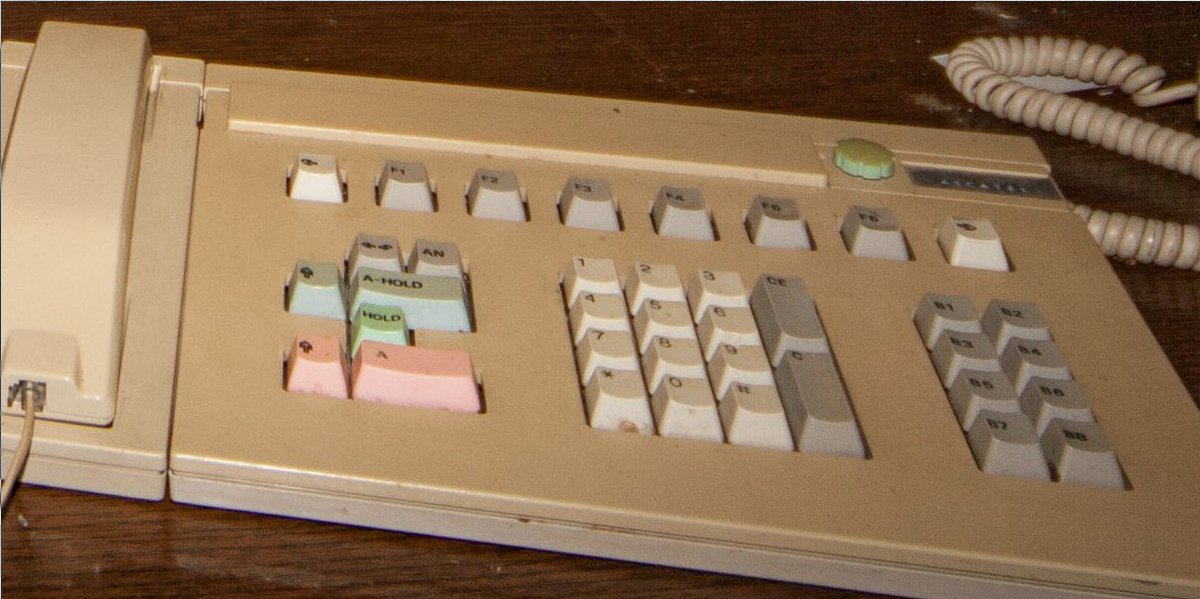 It's proving to be pretty difficult to Google old tech for stuff that (most likely) wasn't sold in North America  I'm currently focused on the keyboard, which has some interesting keys like "AN", "A-HOLD", "B1" through "B8" etc.