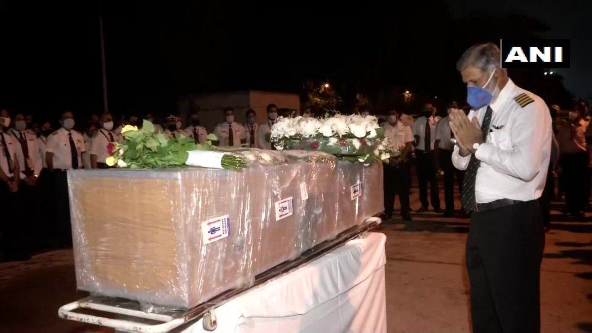 ANI's tweet photo. Delhi: Mortal remains of co-pilot Akhilesh Kumar who lost his life in the flight crash landing incident at #Kozhikode arrives at Delhi Airport. Air India Express employees pay tributes to him. 

His mortal remains are being taken to his native place in Mathura, Uttar Pradesh. https://t.co/vSlqc9tabW