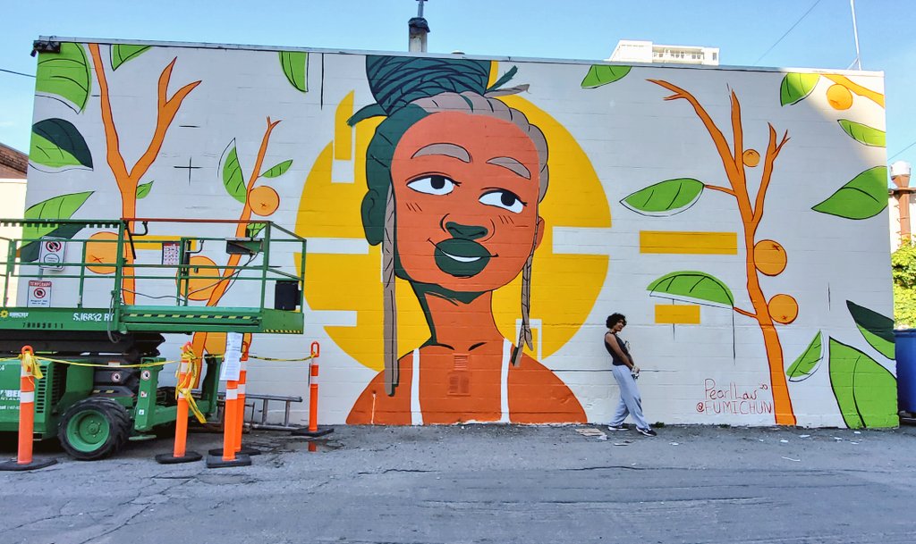 🍊Precious Fruit🍊
Black joy is so important to see cause not only is it revolutionary, it is extraordinary, &amp; beautiful. I wanted to paint a Black woman exuding joy, in all her glory, in front of a deconstructed sun, surrounded by oranges on branches. 
She's done🙏🏾
1138 Davie st