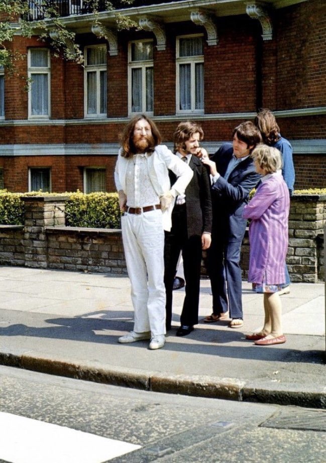 OriginalYoni's tweet photo. 51 years ago today: Photographer lain Macmillan captures The Beatles crossing Abbey Road — arguably the most iconic album cover of all time. https://t.co/hcVslV909j