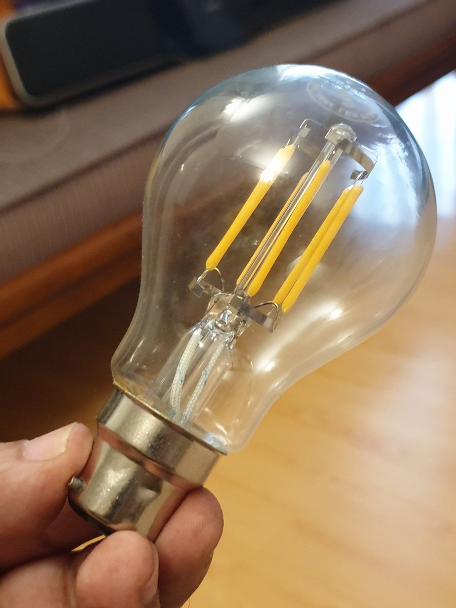 So: LED-filament v pretty, but only worth it if it's visible and not all covered up by frosted glass. Regular LED warm white is half the price. Can't tell about life (claim: 25k hours. Nonsense). For largely decorative use, there are prettier shapes (e.g 4W E27: pic4). 5/n