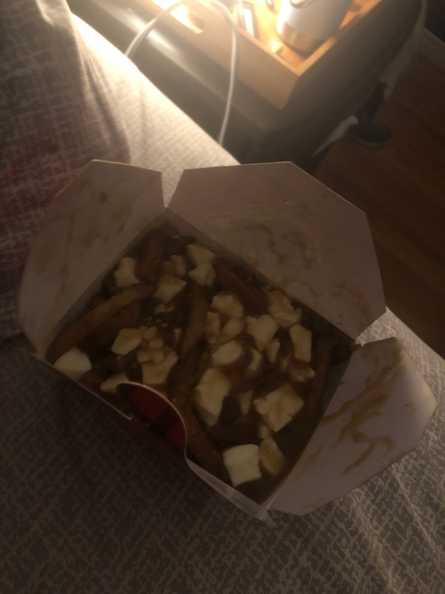 EhThroughZed's tweet photo. No, YOU’RE eating poutine in bed at 1:30am.

One of the best things about being back in Canada. Thanks, @poutinerie. Also, I may have carefully taken the sticker off the bag and put it on my water bottle.

#dontjudge #poutine #delicious https://t.co/jSCSpFsbos