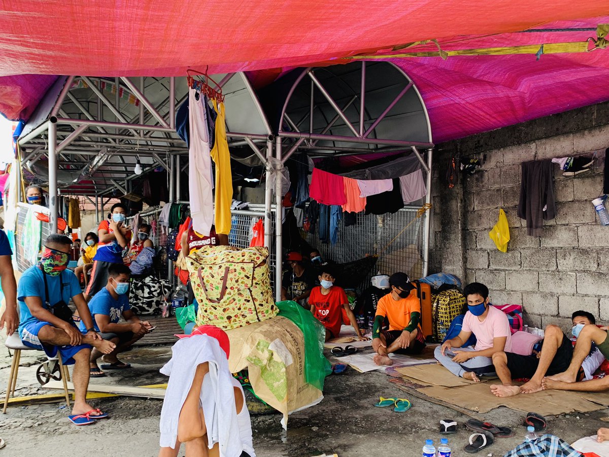 Nearly 100 stranded individuals seek shelter at a tent at the SMD Area of the North Port Passenger Terminal in Manila while they wait for boat trips to their home provinces. @ABSCBNNews