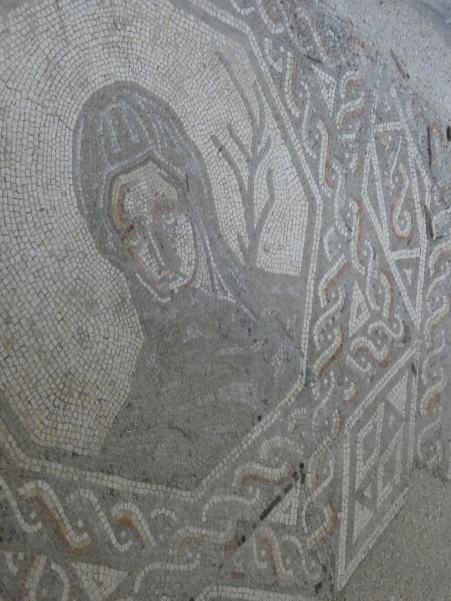 In room 8 only the head of Winter survives from the mosaic. Originally it would have depicted the four seasons like the one mentioned above.