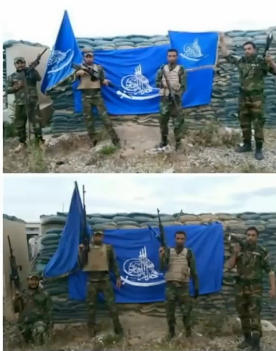 Soldiers of the Iraqi army waving the flag of Yasser al Habib's militia, Khoddam al Mahdi.