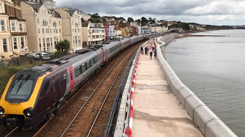 The new 2.5m high sea wall at Dawlish is now open to the public. The 360-metre structure is the first part of <a href="/networkrailwest/">Network Rail Western</a>'s plan to protect the railway and communities from the sea. Work to install seating and lighting will be completed later this year.