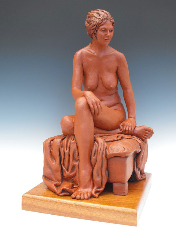 This engaging sculpture by Judith A. Long titled "Being in the Moment" is from her "Modern Madonnas" series. She has mastered the female form with versatility and expresses the beauty and celebration "of modern everyday women"  healing-power-of-art.org/judith-a-long