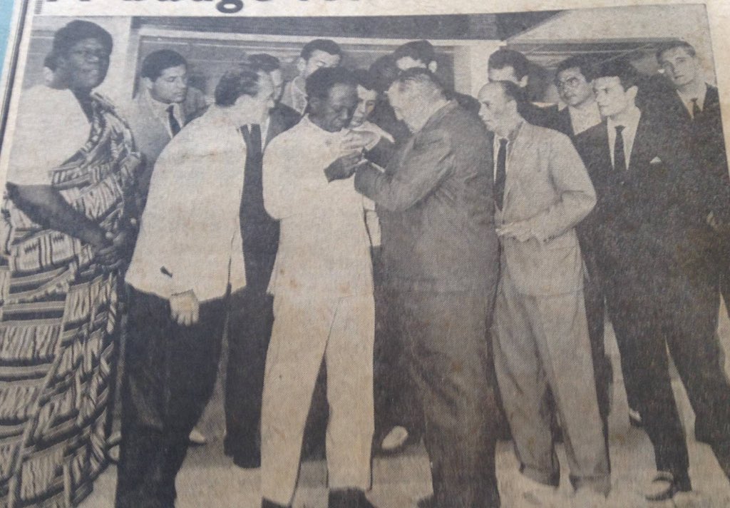 Real Madrid president Santiago Bernabeu pinning his club’s badge on the chest of Kwame Nkrumah (middle, all white) after the Spanish giants visited Ghana and were held by the Black Stars to a 3-3 draw in 1962. Ohene Djan (1st from left) looks on.