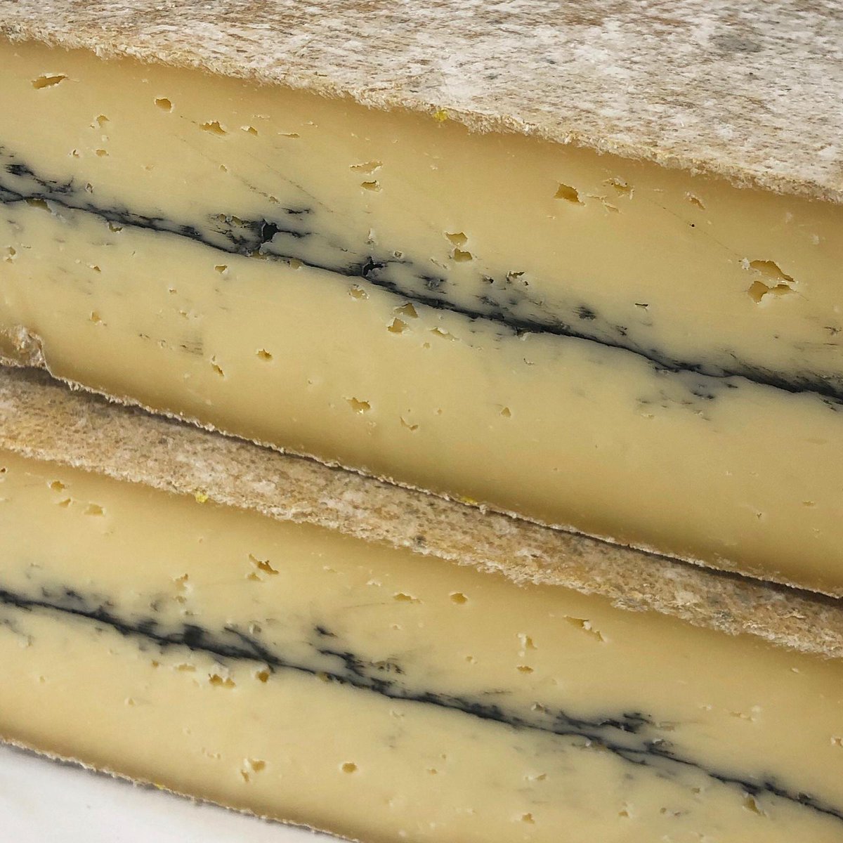 Ashcombe is the latest cheese from <a href="/KingStoneDairy/">King Stone Dairy</a> in Chedworth, Gloucestershire. It is a French style cow's milk cheese that is similar to Morbier. We have been tasting it throughout its development over the last 10-12 weeks and it's now ready to sell to our wholesale customers.