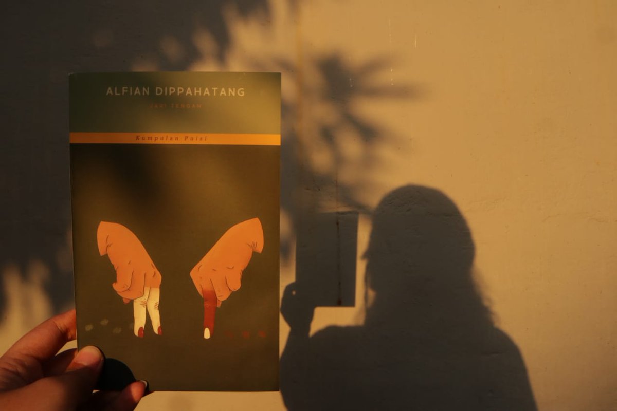 suatu sore buku puisi "jari tengah" bersamamu.