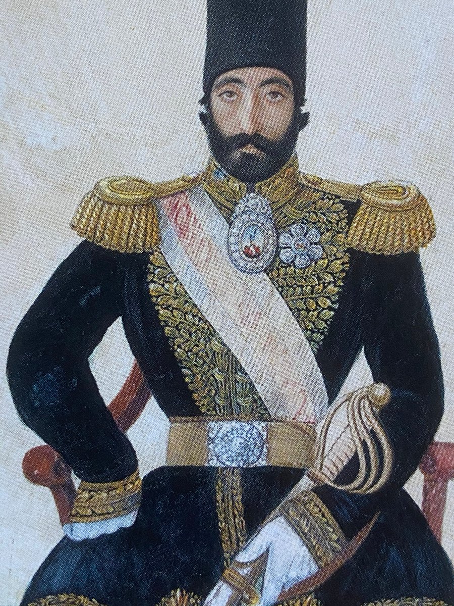 The rest of Husam al-Saltana's dress here is noticeably European in style. The gold braid epaulettes are a particular clue. This is following changes to military attire which became widespread during the reigns of Muhammad and Nasir al-Din Shah. (Muhammad Shah in the 3rd image).