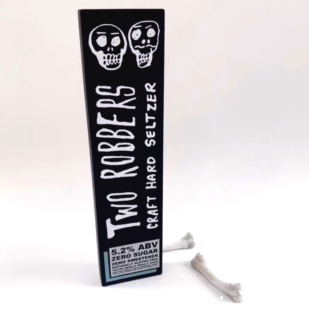 Taphandles's tweet photo. Make no bones about it - Two Robbers Hard Seltzer is a perfect pairing for a sun soaked day... just be sure to keep an eye on it!👀💀👀  Available in NYC, NJ, CT, DE, and PA. 🍻 #Taphandles #sellmorebeer #madeforcraft #seltzer #hardseltzer #spikedseltzer #tworobbers https://t.co/Qnm6D2HeAe