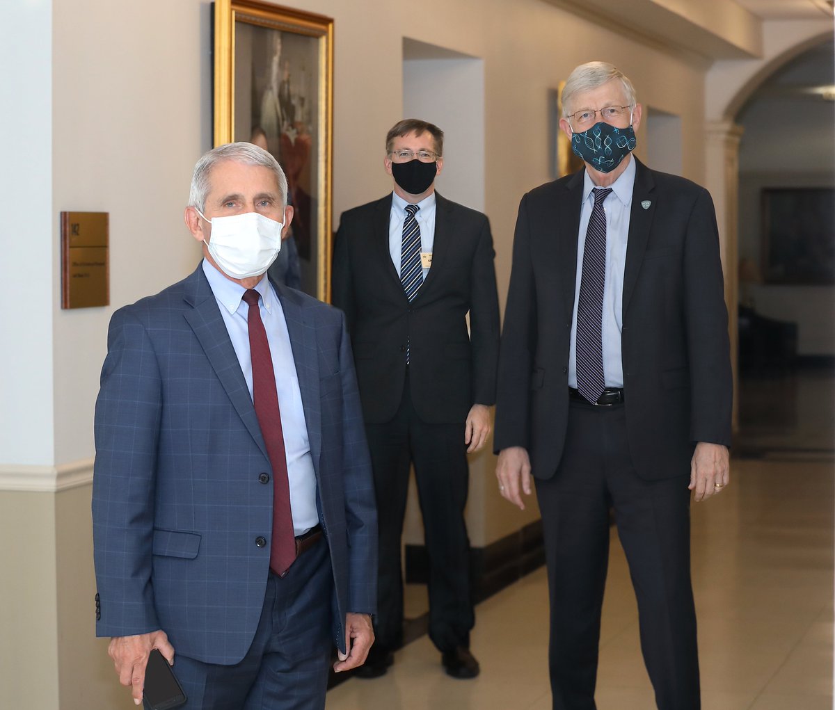 NIH's tweet photo. These docs are using science to fight #COVID19&amp;they’re serious about winning. From left, @NIAIDNews Anthony Fauci, #WarpSpeed Matt Hepburn&amp; @NIHDirector Francis Collins briefed reporters yest. about start of 1st Phase 3 #NIH/Moderna mRNA-1273 vaccine trial https://t.co/Z52TALYVhI https://t.co/vrqFDXy9Jm