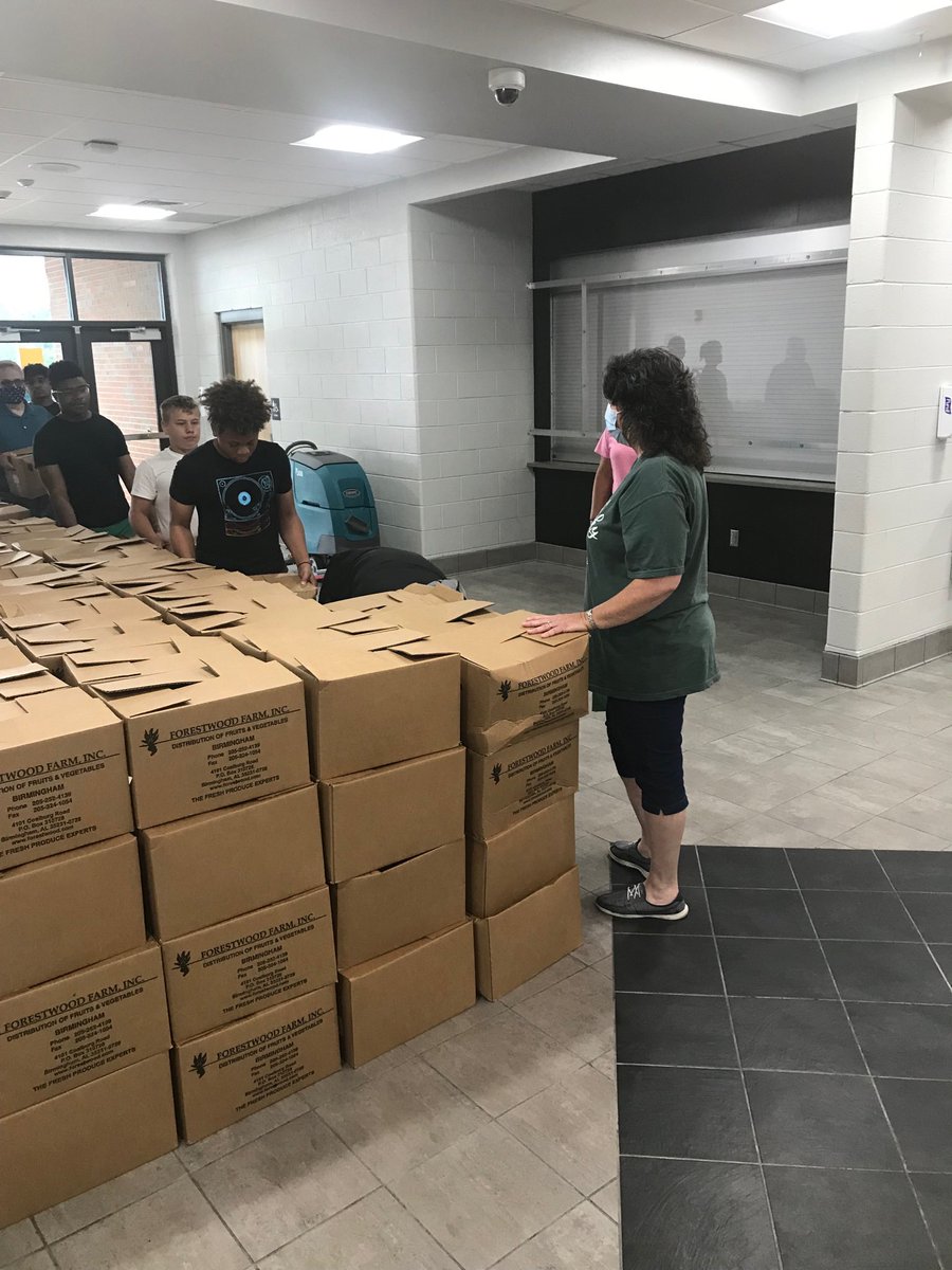 Food give away at Saks High today.  Thank you athletes for unloading the truck!