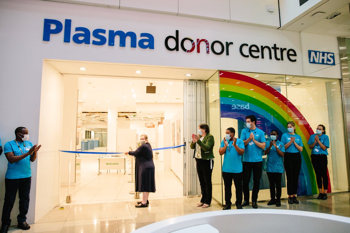 GiveBloodNHS's tweet photo. Ann, the first person in the UK to receive COVID-19 convalescent plasma, has cut the ribbon to officially open our new plasma donor centre @westfieldstrat.

https://t.co/9pvsomEN2i https://t.co/gRJvwaaKz6