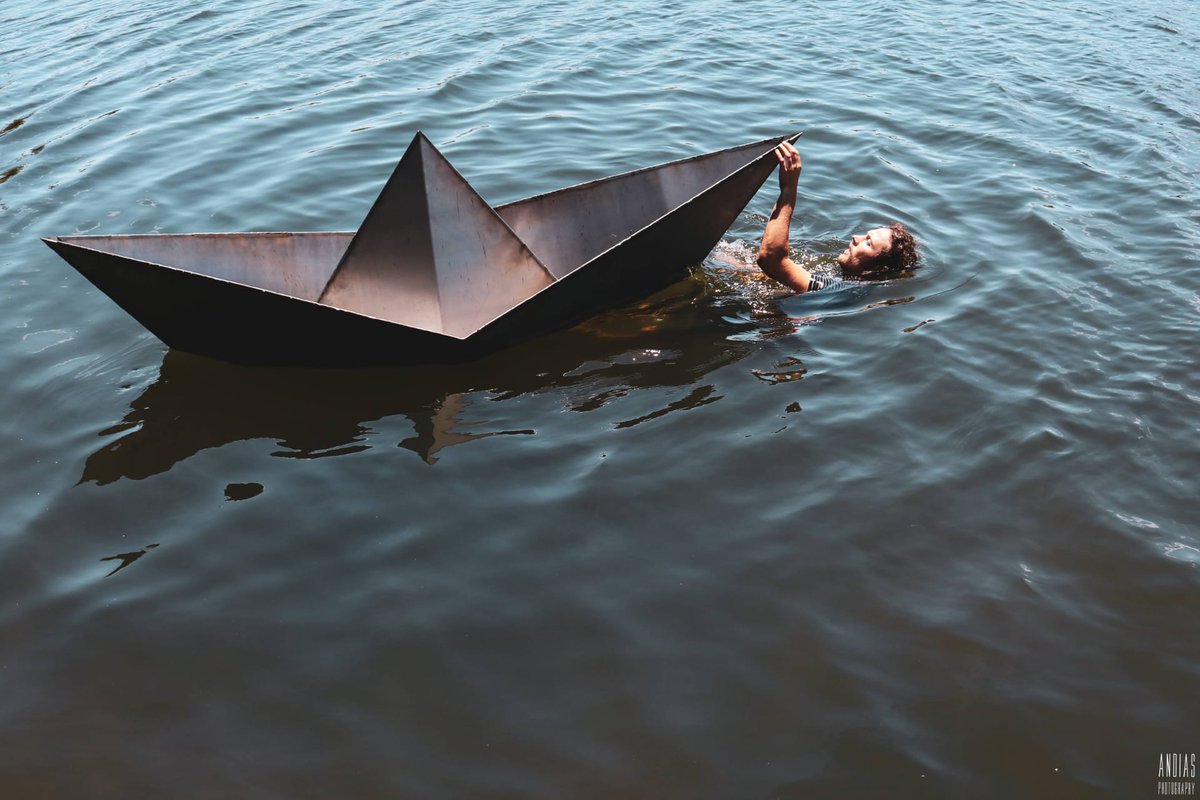 SamuelZealey's tweet photo. 'Fleet', 2020. This installation took place for two festivals in Portugal - Águeda and Aveiro. Four origami folded steel boats that float. Each piece is named after a great waterway. The first four boats of this body are called - 'Águeda', 'Elbe', 'Seven' and 'Arno'. https://t.co/TEVxGQ35NT